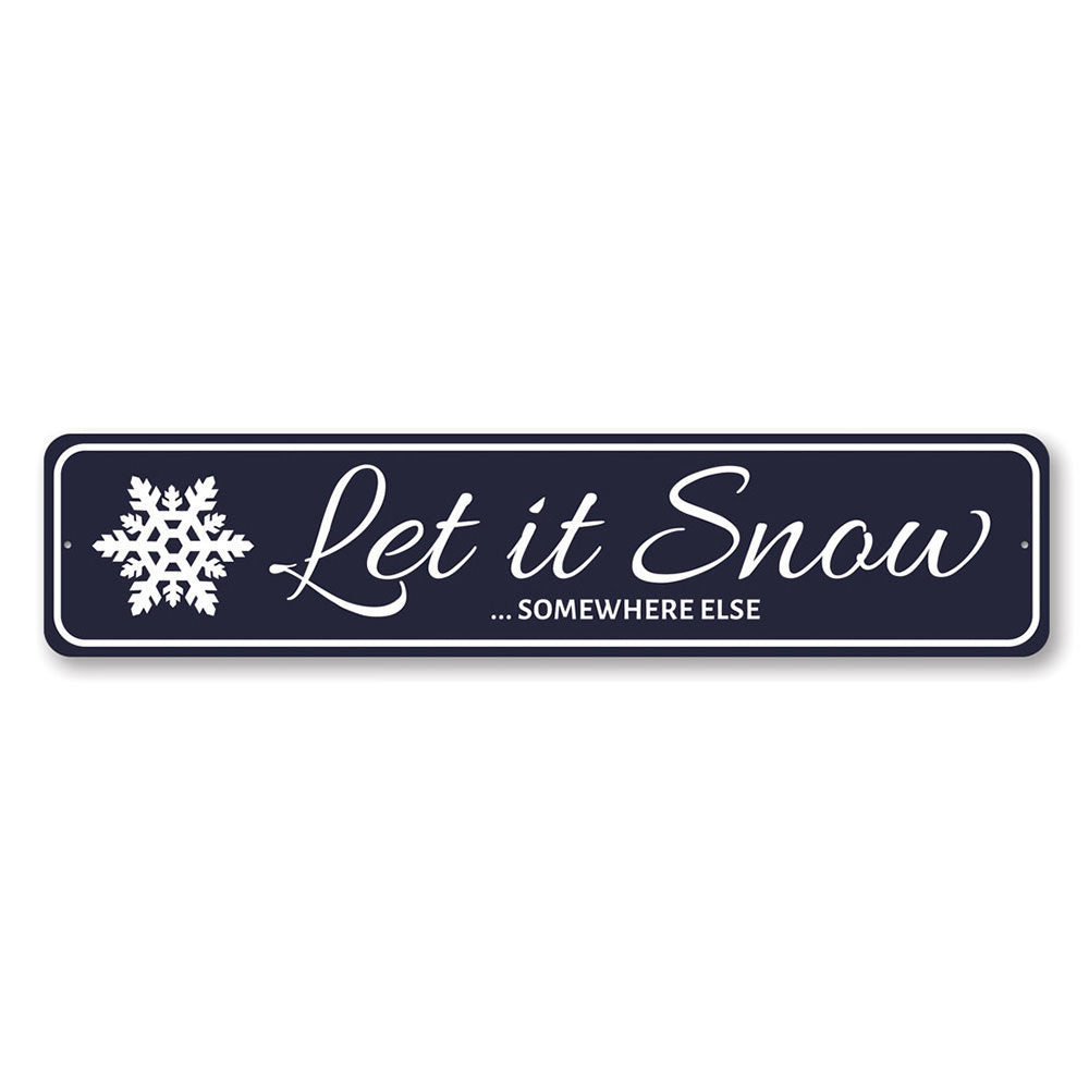 Let It Snow Somewhere Else Holiday Sign made of durable aluminum, featuring festive design perfect for Christmas decorations.