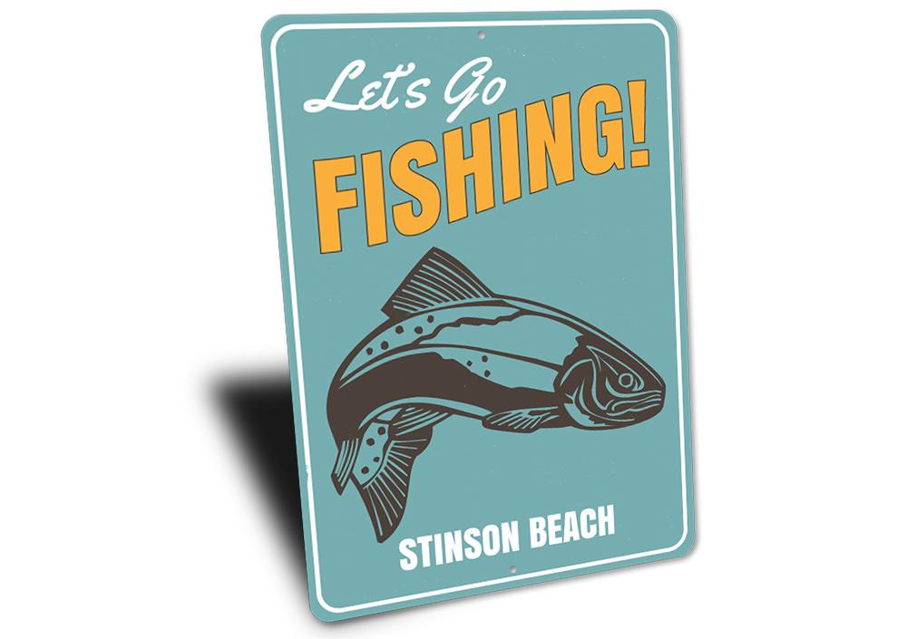 A decorative Let's Go Fishing location sign made of high-quality aluminum, featuring a vibrant design perfect for lakehouses.