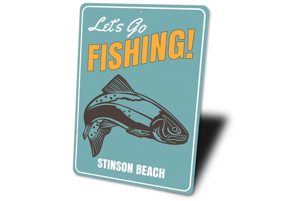 A decorative Let's Go Fishing location sign made of high-quality aluminum, featuring a vibrant design perfect for lakehouses.