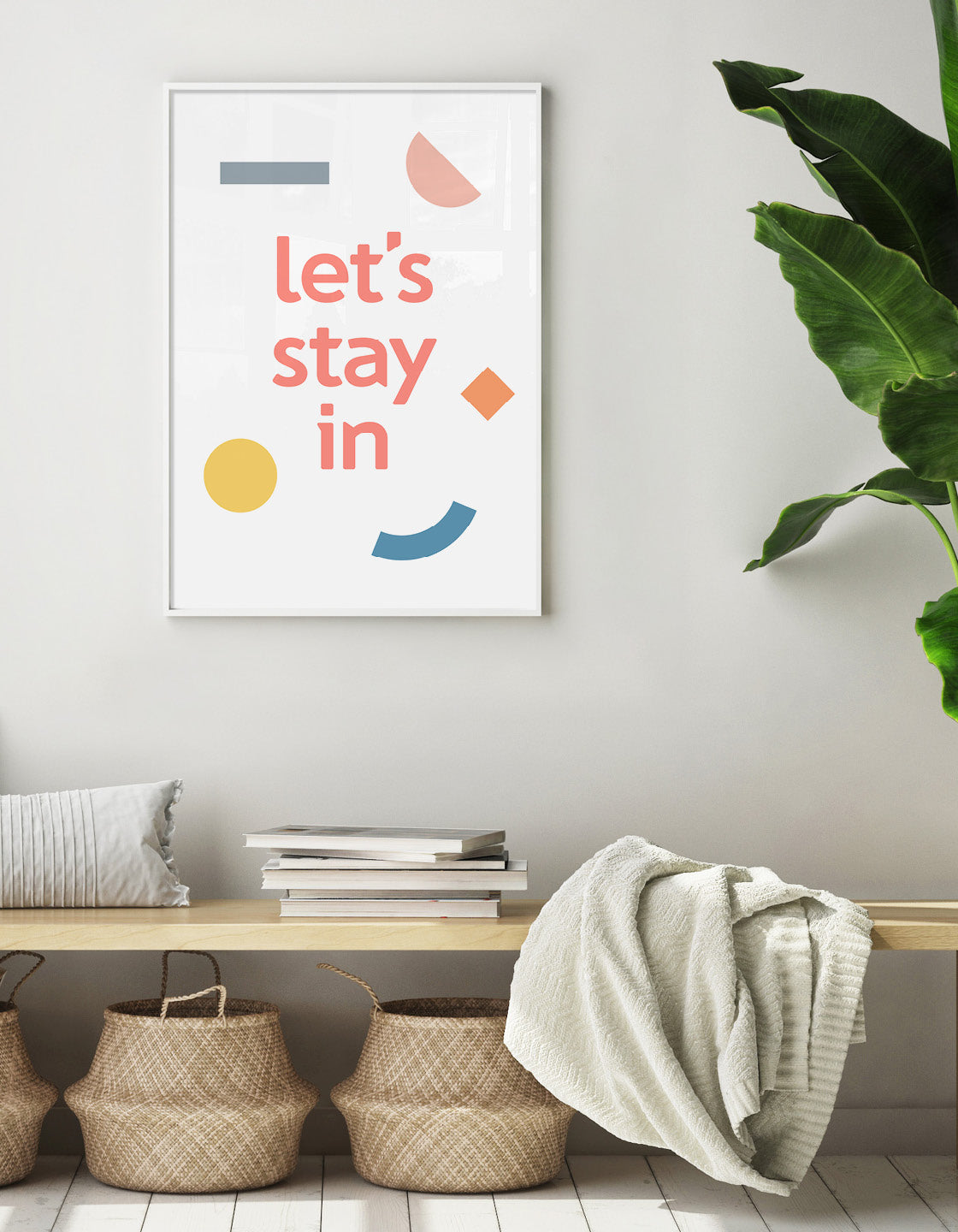 A vibrant typographic print titled 'Let's stay in', featuring colorful letters and modern design, perfect for contemporary home decor.