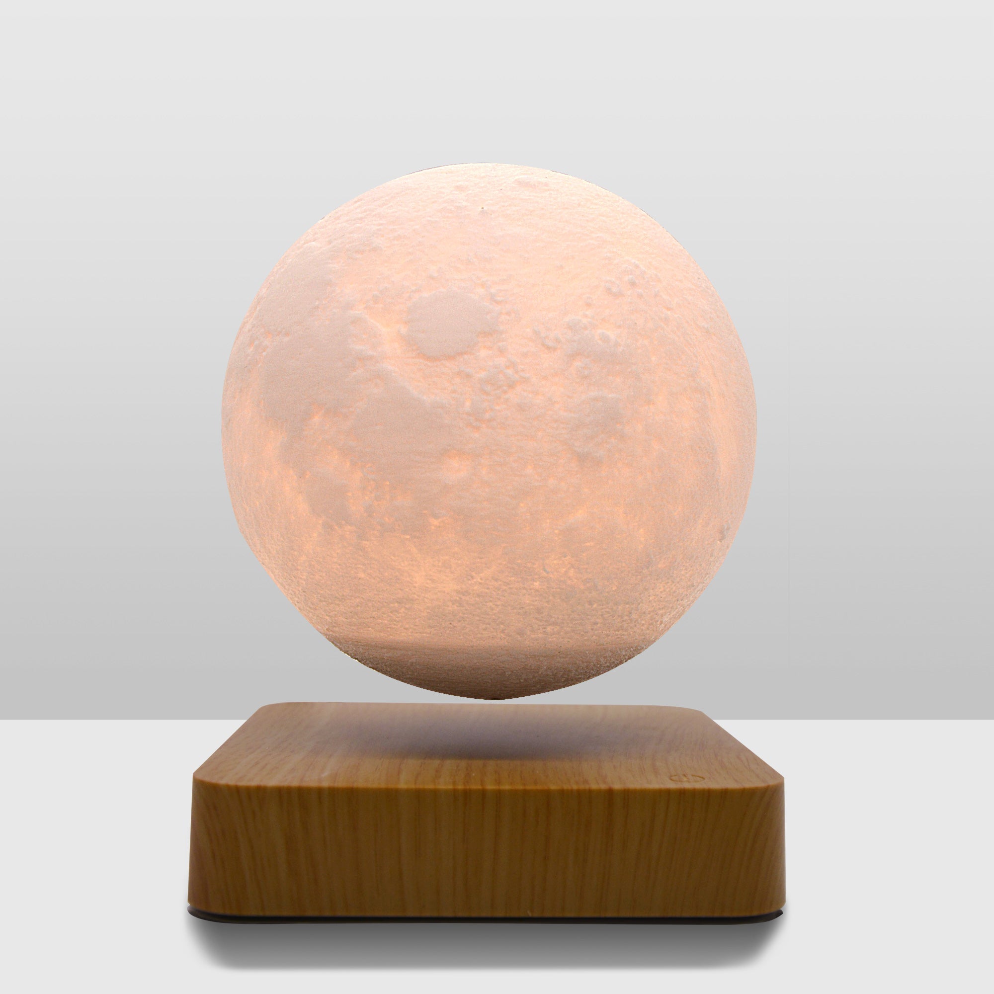 Levitation Moon Lamp showcasing its 3D printed design and magnetic levitation feature, floating in mid-air with a soft glow.