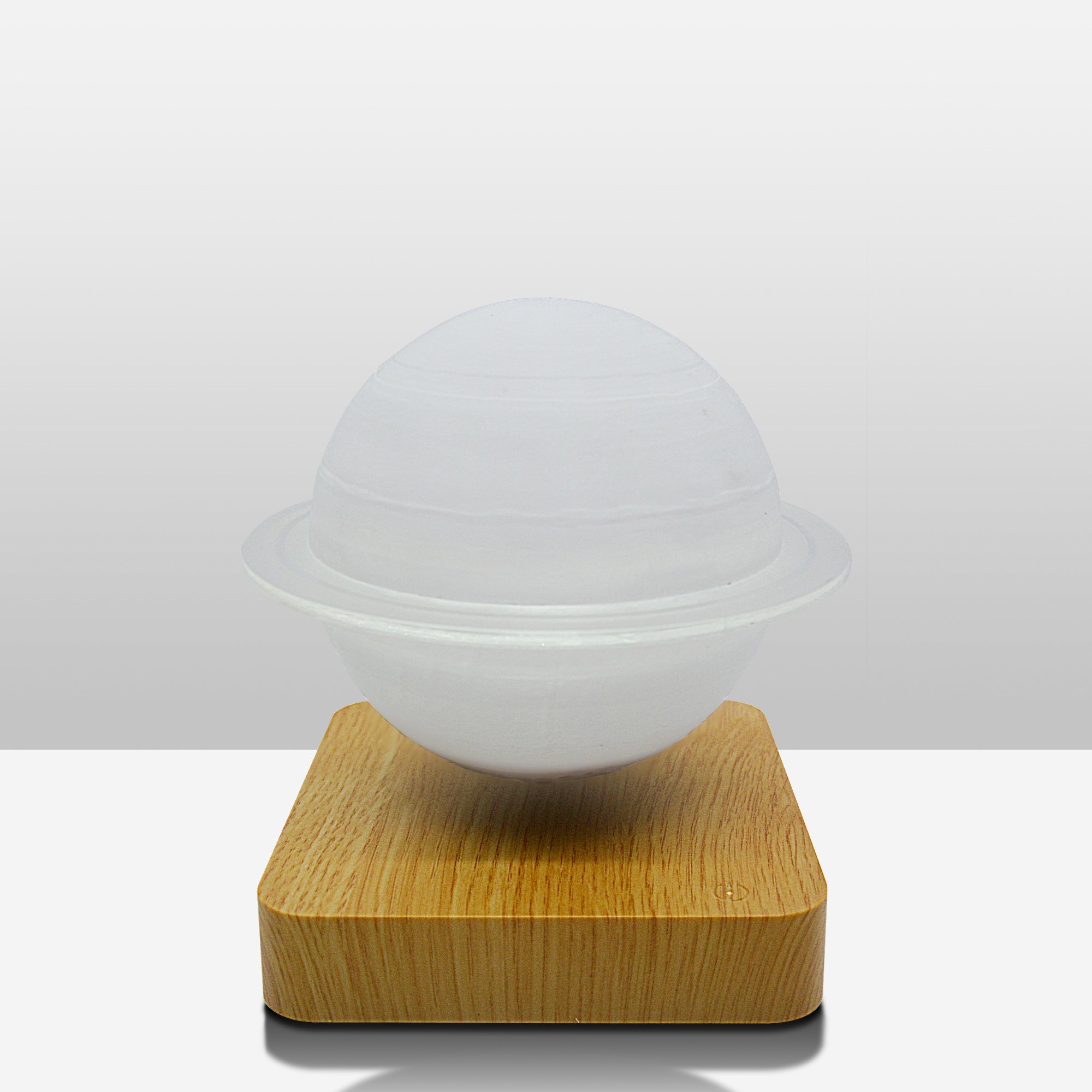 Levitation Moon Lamp showcasing its 3D printed design and magnetic levitation feature, floating in mid-air with a soft glow.