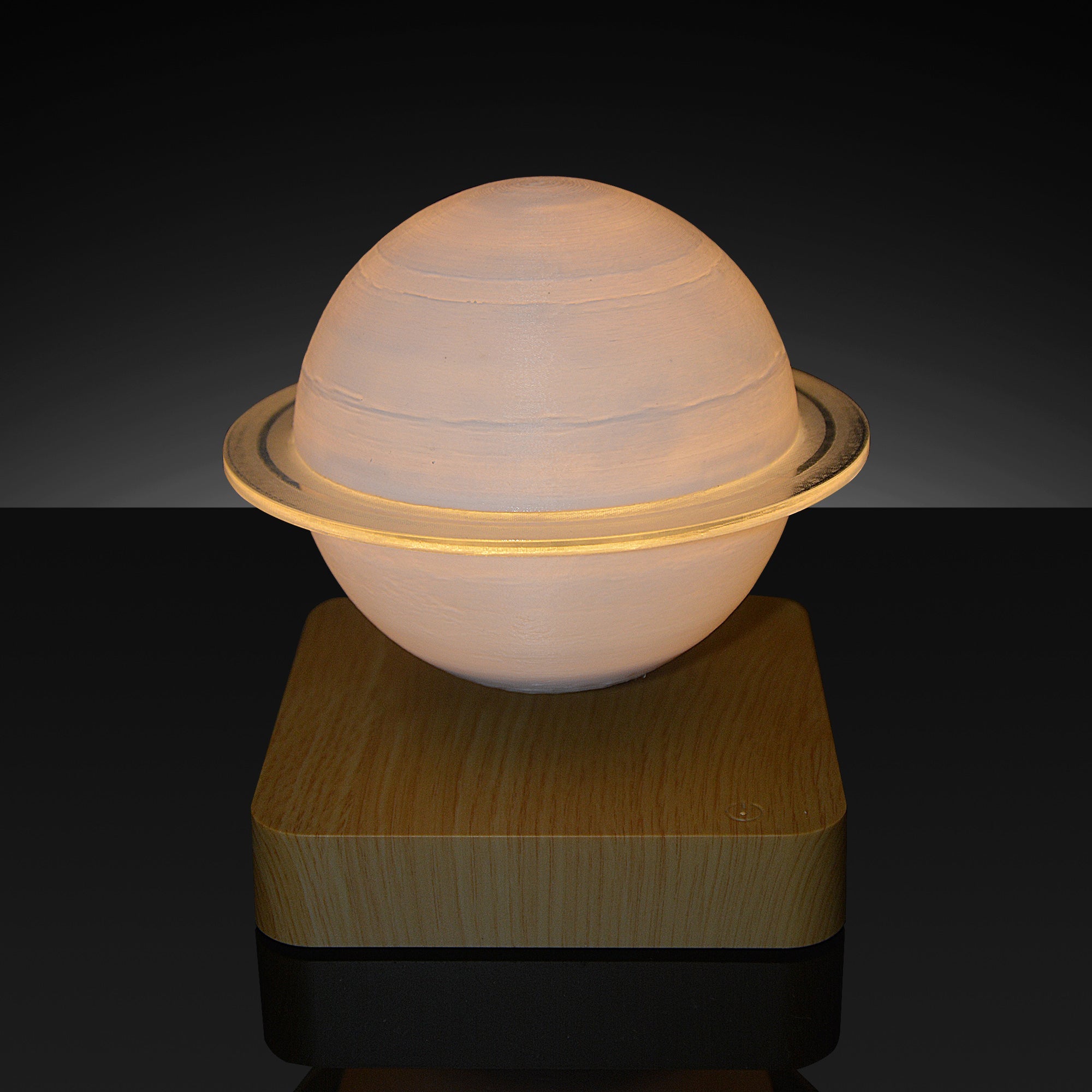 Levitation Moon Lamp showcasing its 3D printed design and magnetic levitation feature, floating in mid-air with a soft glow.