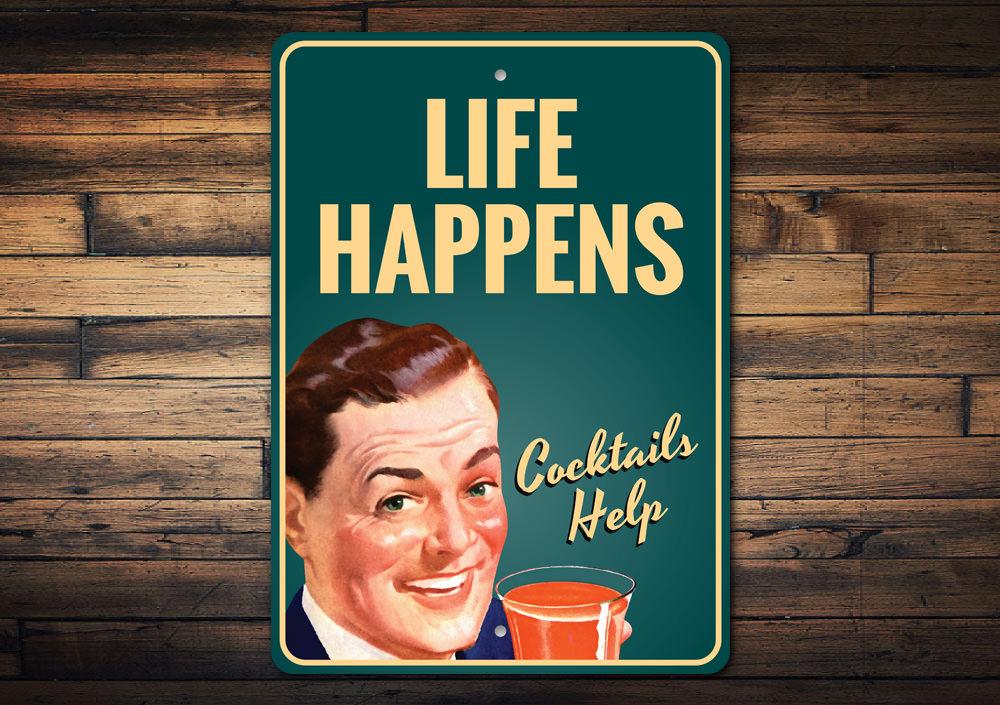 Life Happens Cocktails Help decorative sign made of aluminum, featuring vibrant colors and a fun design, perfect for home decor.