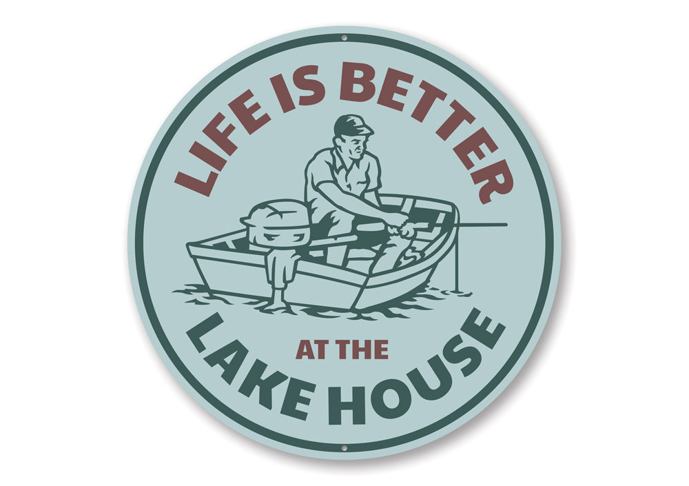 A decorative metal sign reading 'Life is Better at the Lake House', showcasing a beautiful lakeside theme, perfect for home decor.