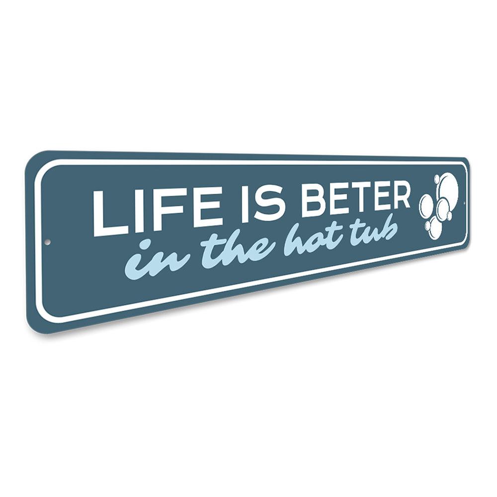 A decorative metal sign reading 'Life is Better in the Hot Tub', showcasing vibrant colors and quality aluminum material, perfect for home decor.