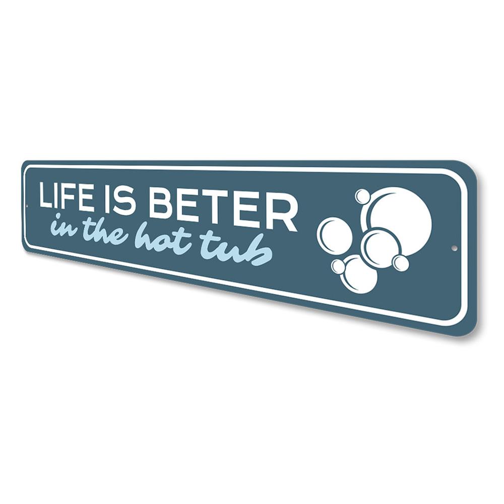 A decorative metal sign reading 'Life is Better in the Hot Tub', showcasing vibrant colors and quality aluminum material, perfect for home decor.