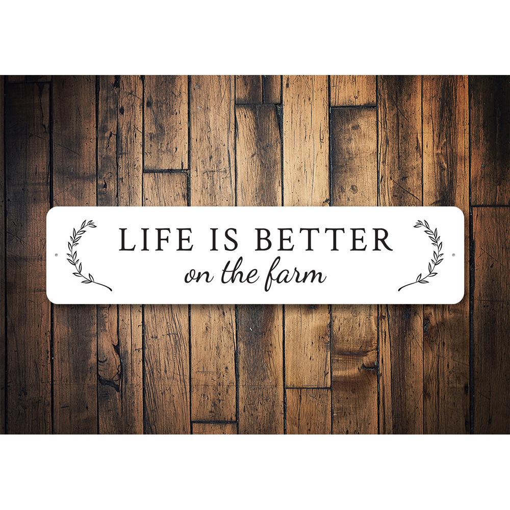 A decorative metal sign reading 'Life is Better on The Farm', showcasing a rustic design suitable for home decor.