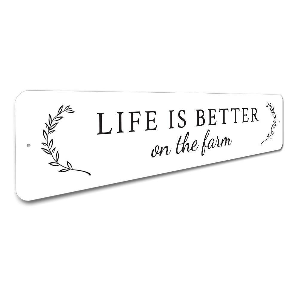 A decorative metal sign reading 'Life is Better on The Farm', showcasing a rustic design suitable for home decor.