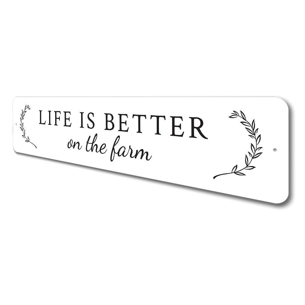 A decorative metal sign reading 'Life is Better on The Farm', showcasing a rustic design suitable for home decor.