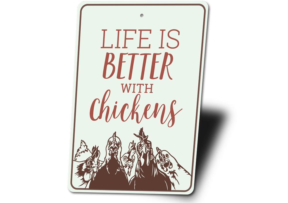 A decorative metal sign reading 'Life is Better with Chickens', showcasing vibrant colors and a charming design, perfect for home decor.