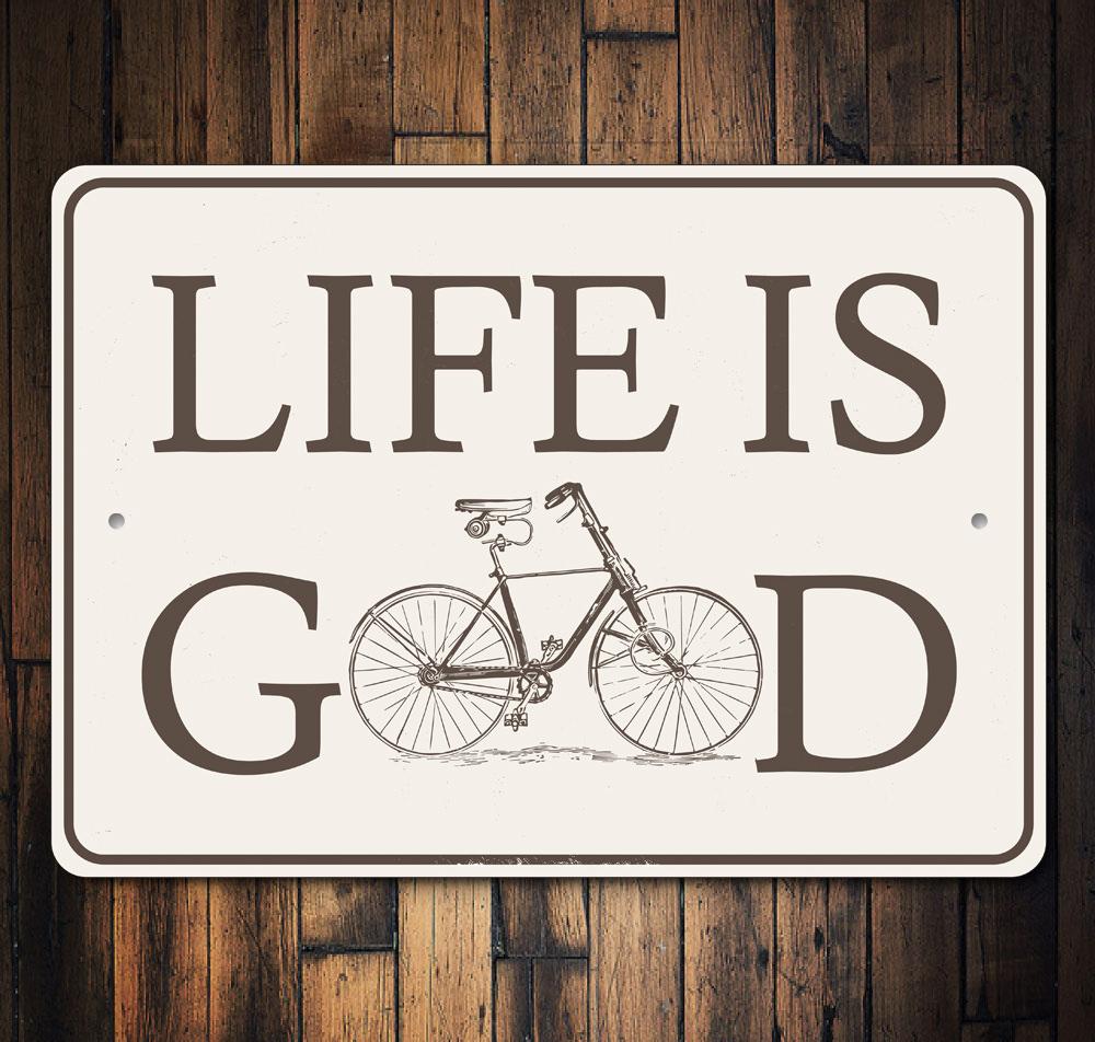 Life is Good Bike Sign made of durable aluminum, featuring a vibrant design perfect for home decor.