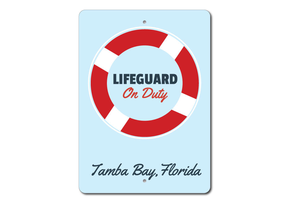 A decorative Lifeguard Sign made of high-quality aluminum, featuring customizable text, perfect for beach houses and coastal decor.