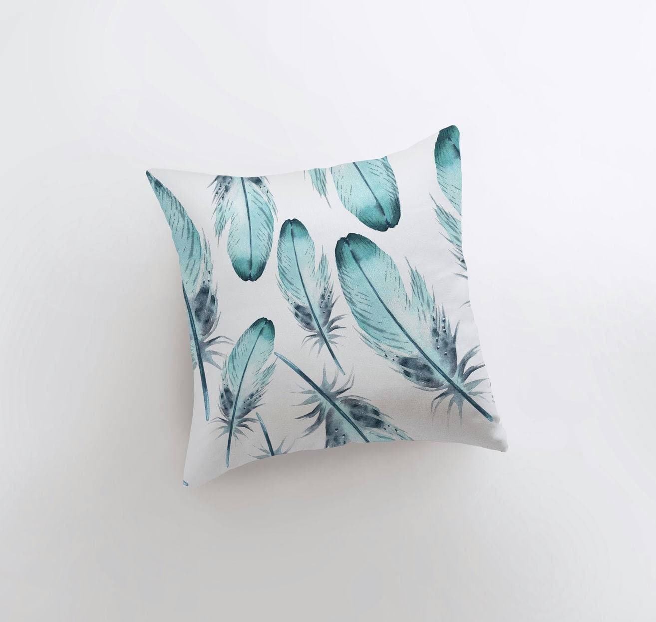 Light Blue Feathers Pillow Cover featuring a blue feather pattern on the front and a double-sided print on the back, handcrafted in America.