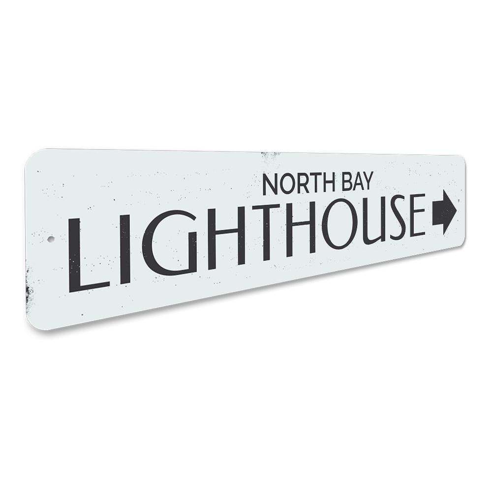 Lighthouse Arrow Sign made of high-quality aluminum, featuring customizable text and a coastal design, perfect for beach-themed decor.