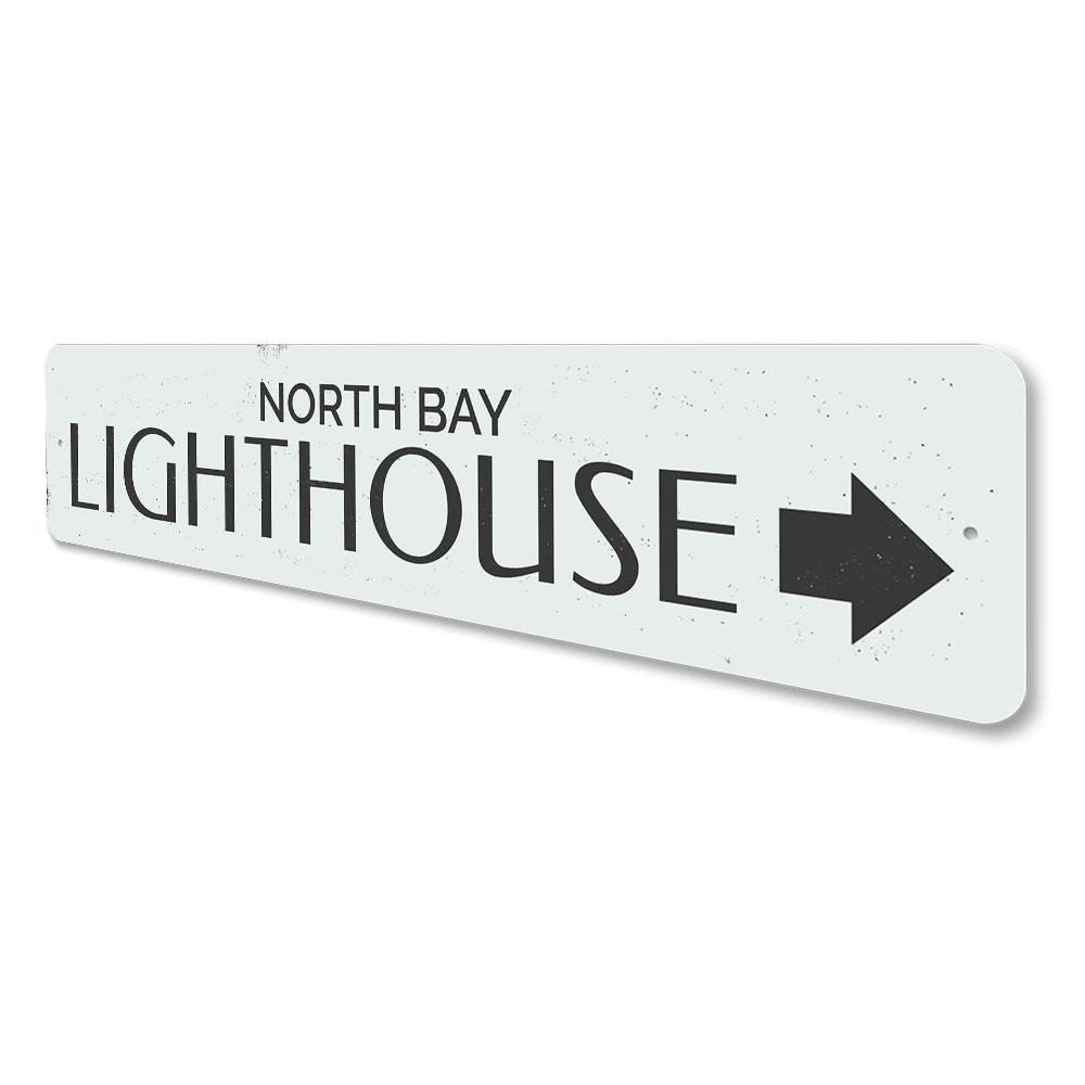 Lighthouse Arrow Sign made of high-quality aluminum, featuring customizable text and a coastal design, perfect for beach-themed decor.