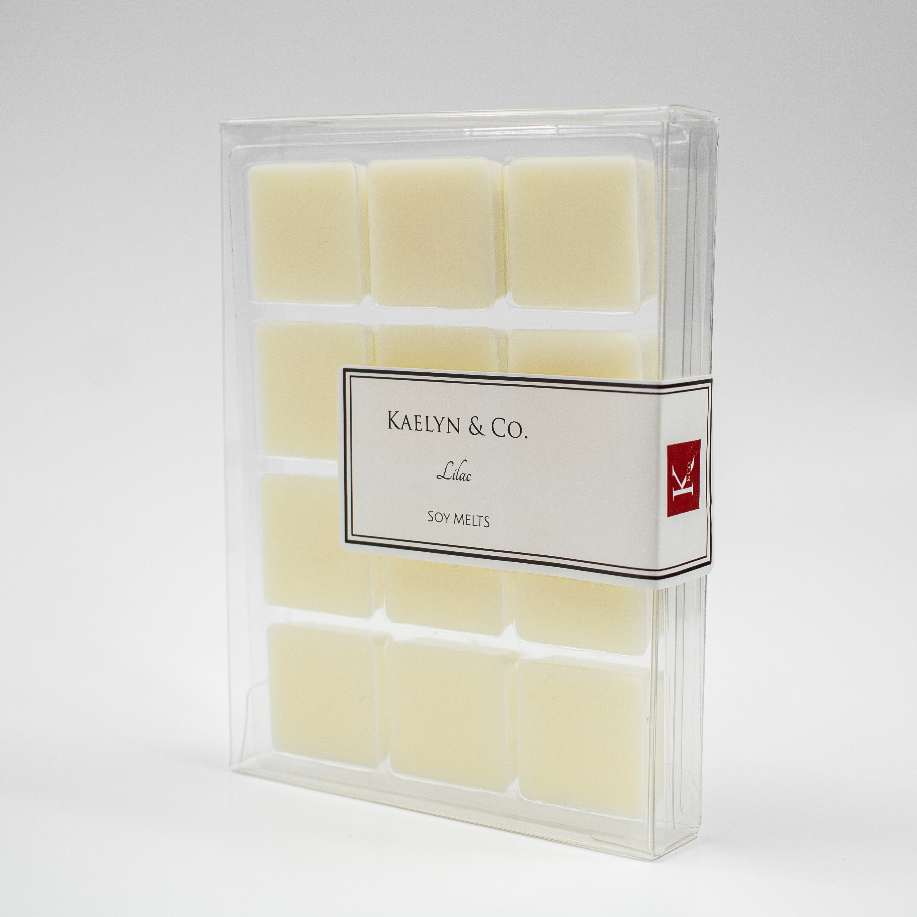 A pack of Lilac Soy Wax Melts featuring twelve cubes, showcasing their vibrant lilac color and eco-friendly packaging.