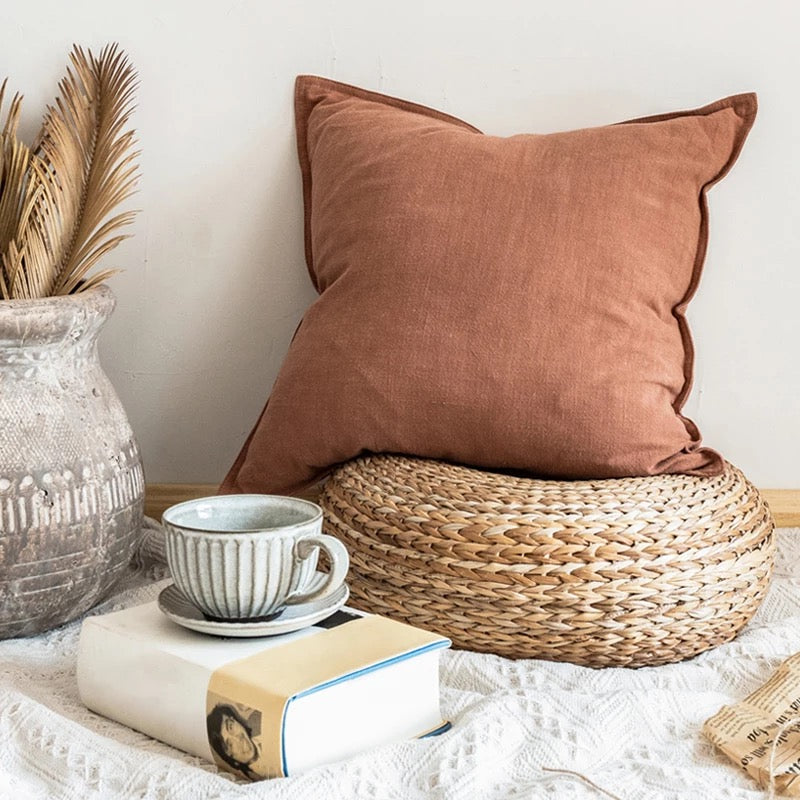 18x18 inch linen throw pillow cover in natural dyes, featuring a zipper closure and soft texture.