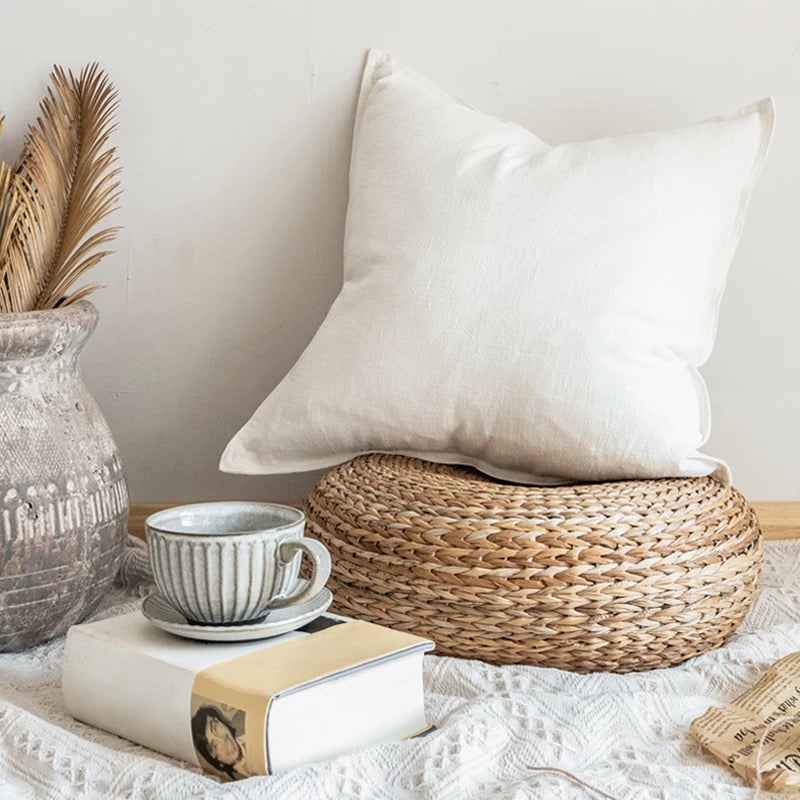 18x18 inch linen throw pillow cover in natural dyes, featuring a zipper closure and soft texture.