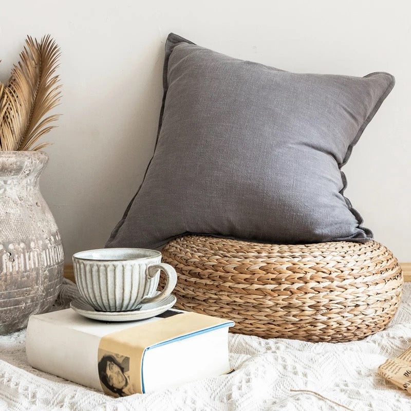 18x18 inch linen throw pillow cover in natural dyes, featuring a zipper closure and soft texture.