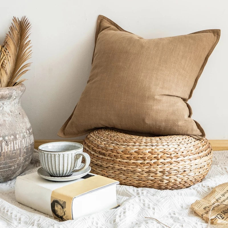 18x18 inch linen throw pillow cover in natural dyes, featuring a zipper closure and soft texture.