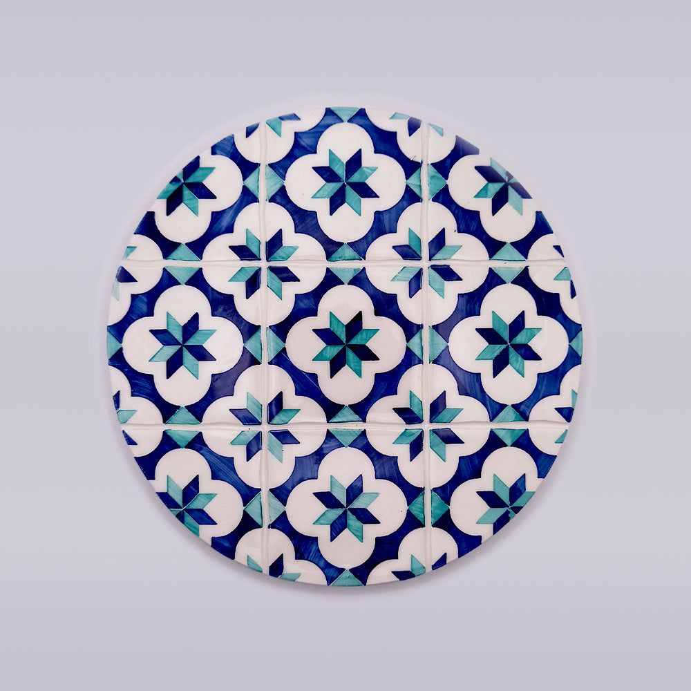 Lisbon Ceramic Trivet featuring vibrant hand-painted designs, perfect for protecting surfaces from hot pots.