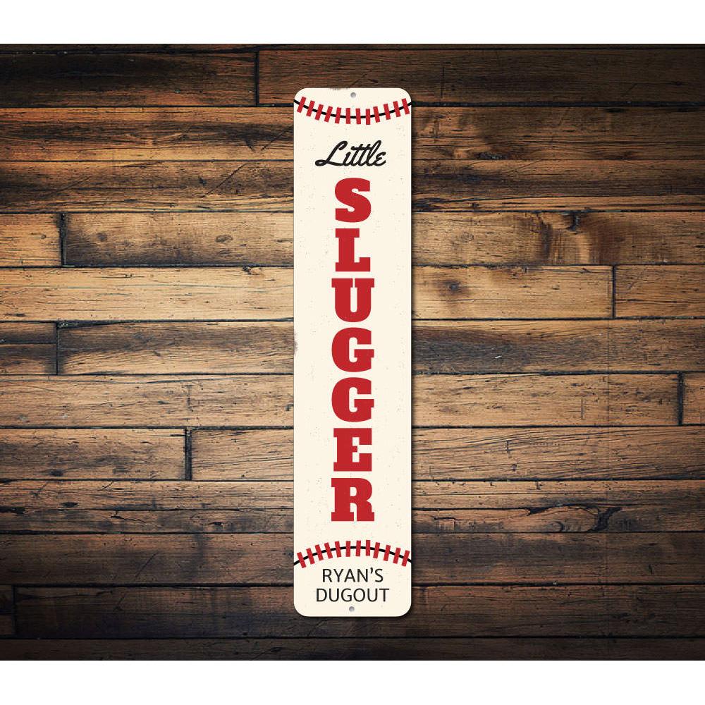 A colorful Little Slugger Sign made of aluminum, featuring customizable text, perfect for children's rooms.