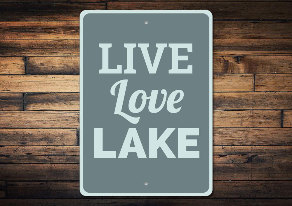 A decorative Live Love Lake Sign made of high-quality aluminum, showcasing a beautiful lake-themed design, perfect for lakehouse decor.