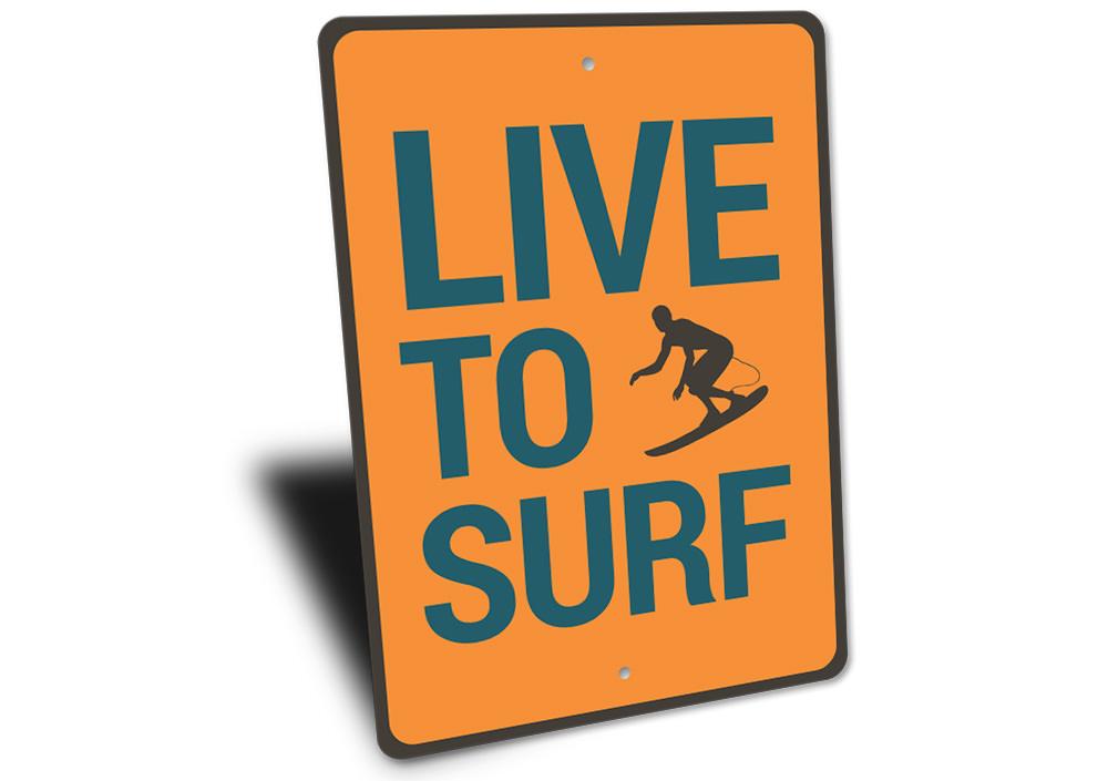 Live to Surf Sign made of high-quality aluminum, featuring a beach-themed design, perfect for coastal decor.