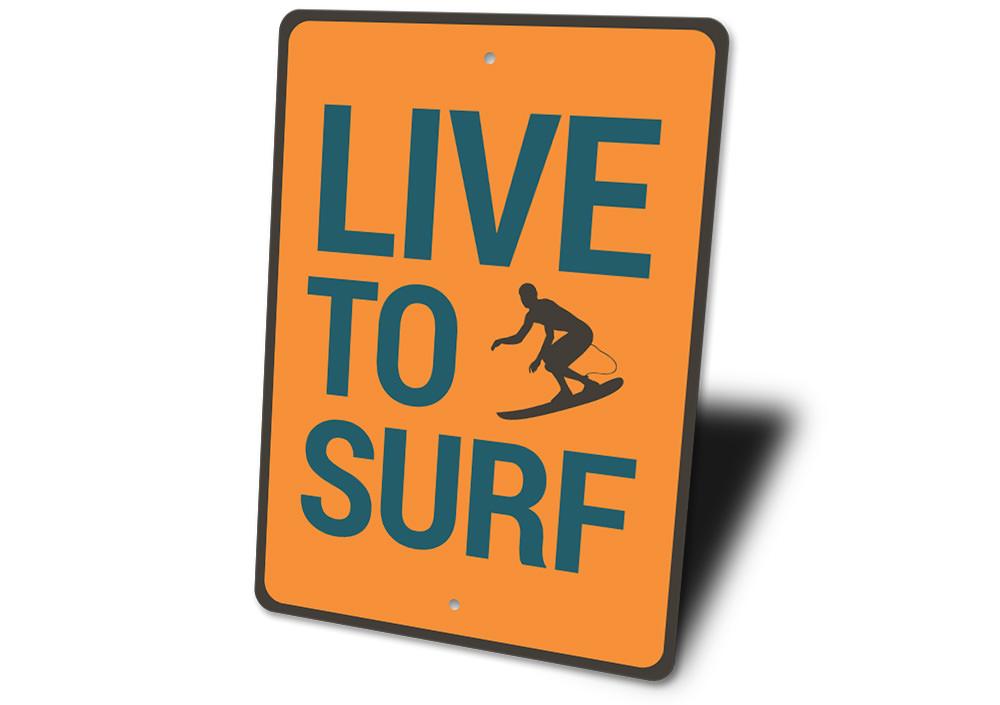 Live to Surf Sign made of high-quality aluminum, featuring a beach-themed design, perfect for coastal decor.