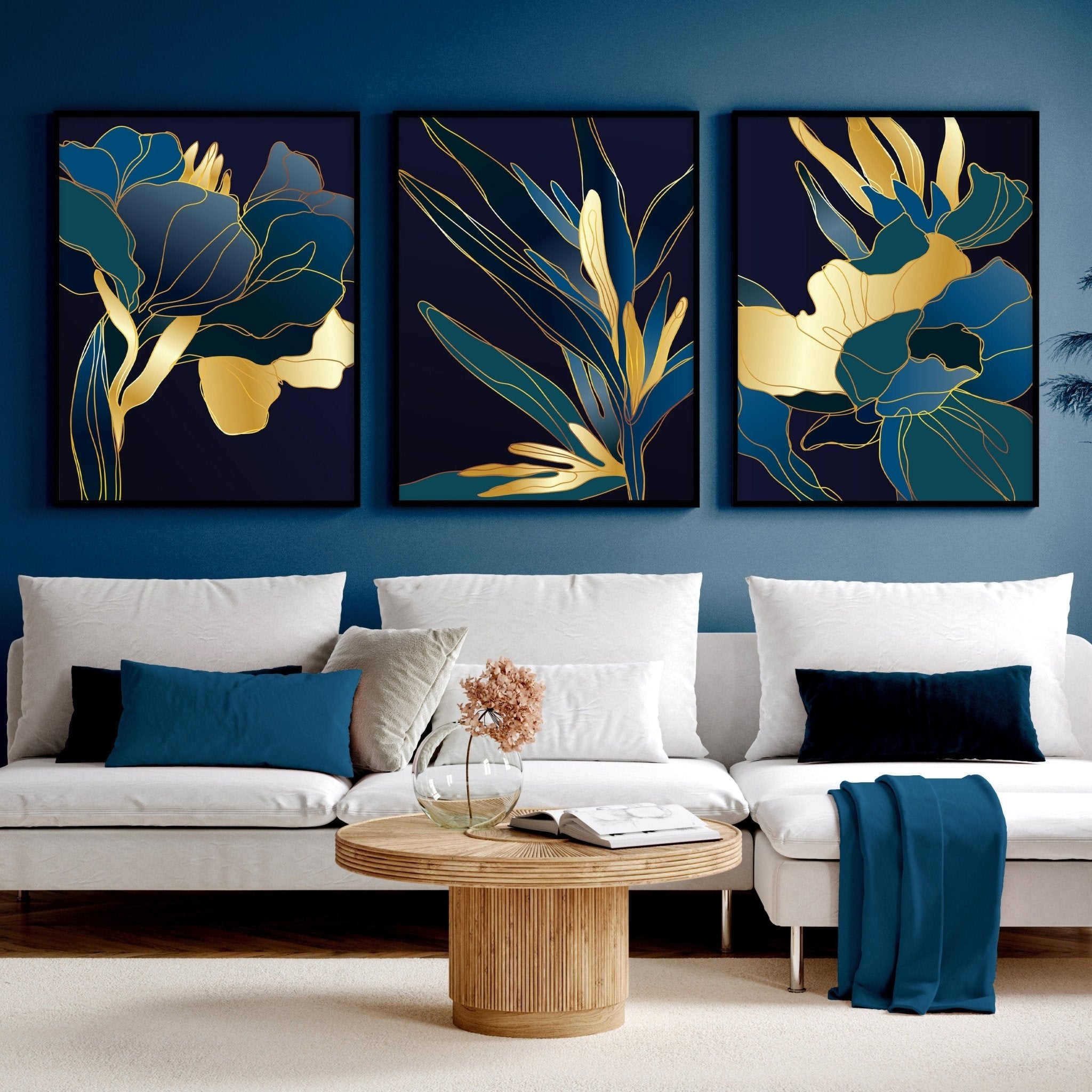 Set of 3 teal wall art prints featuring modern botanical designs in vibrant colors, perfect for enhancing living room decor.