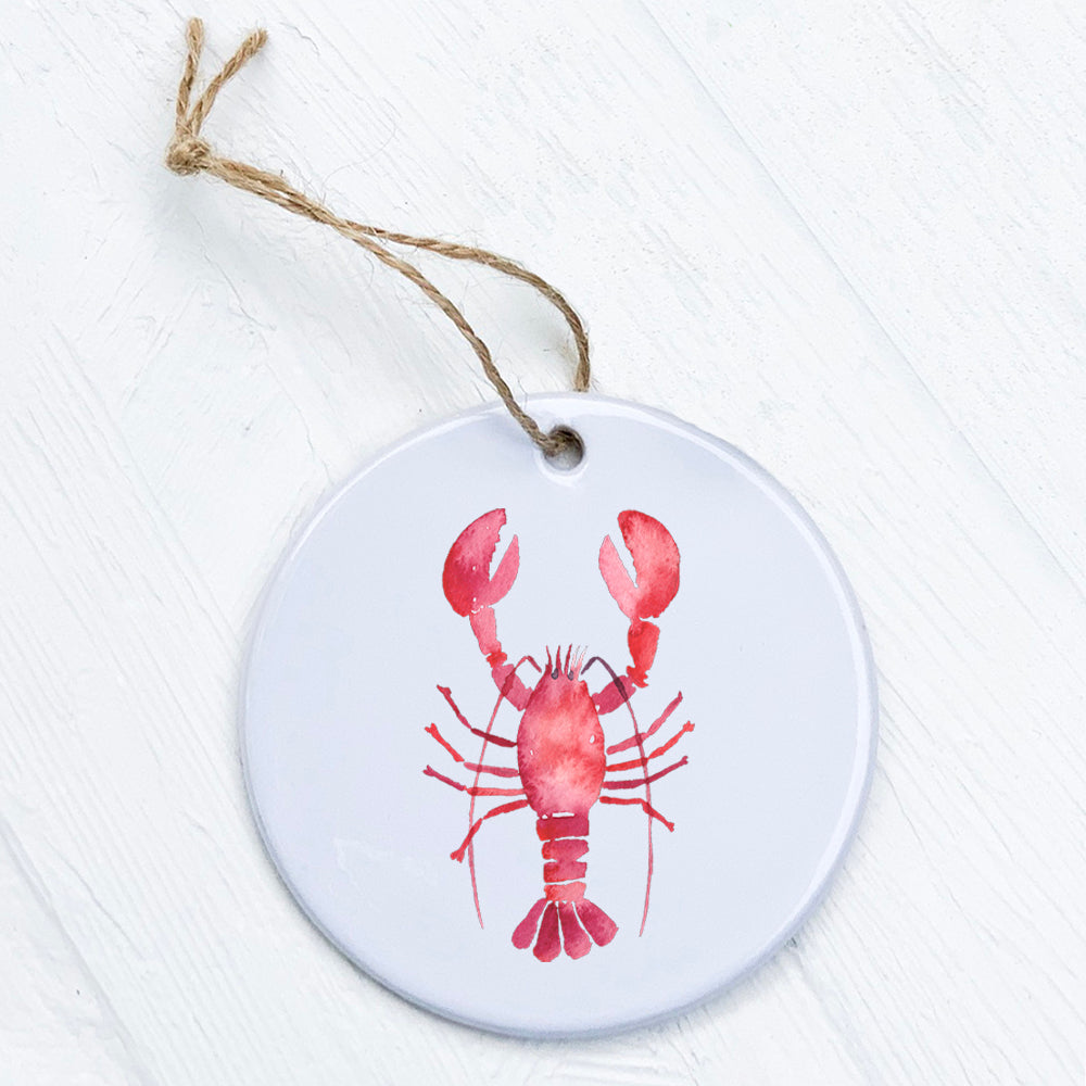 A beautifully crafted porcelain Lobster Ornament featuring vibrant colors and a glossy finish, perfect for home decor or gifting.