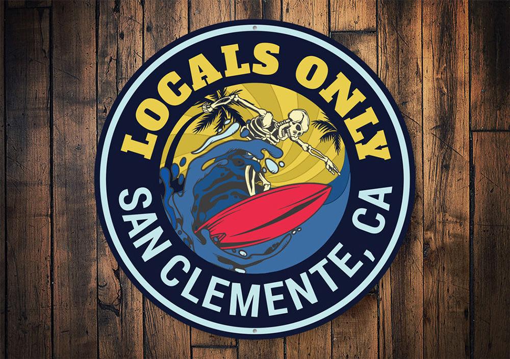 Locals Only Surfer Sign made of high-quality aluminum, featuring a beach-themed design perfect for coastal decor.