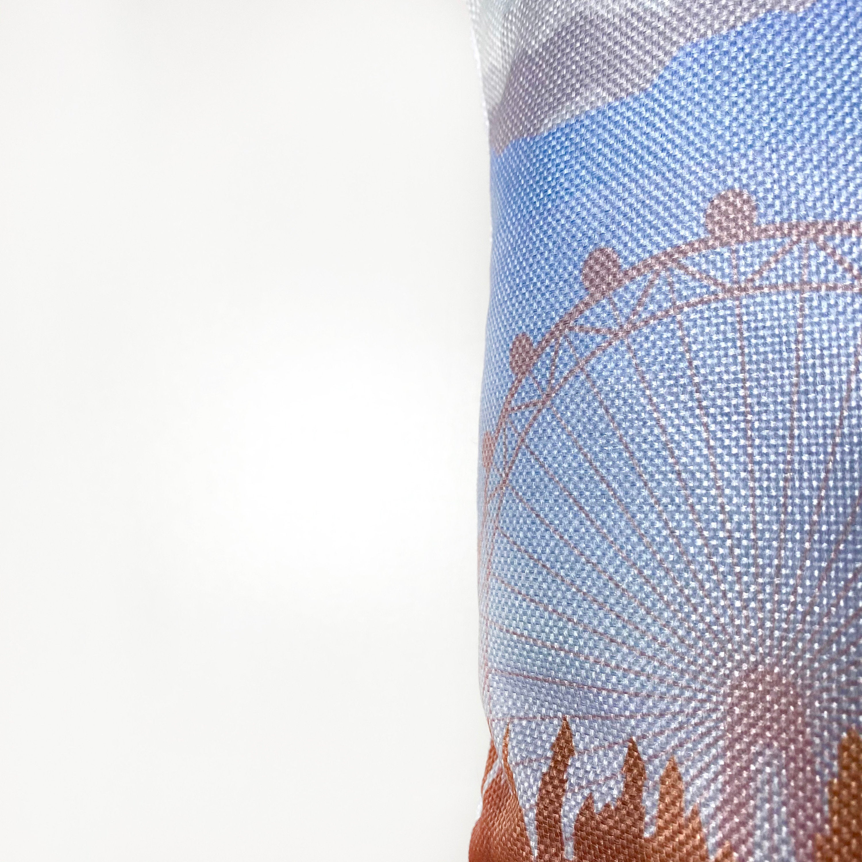 Hand-made 12x18 pillow cover featuring a travel poster design of London, showcasing iconic landmarks like Big Ben and the London Eye.