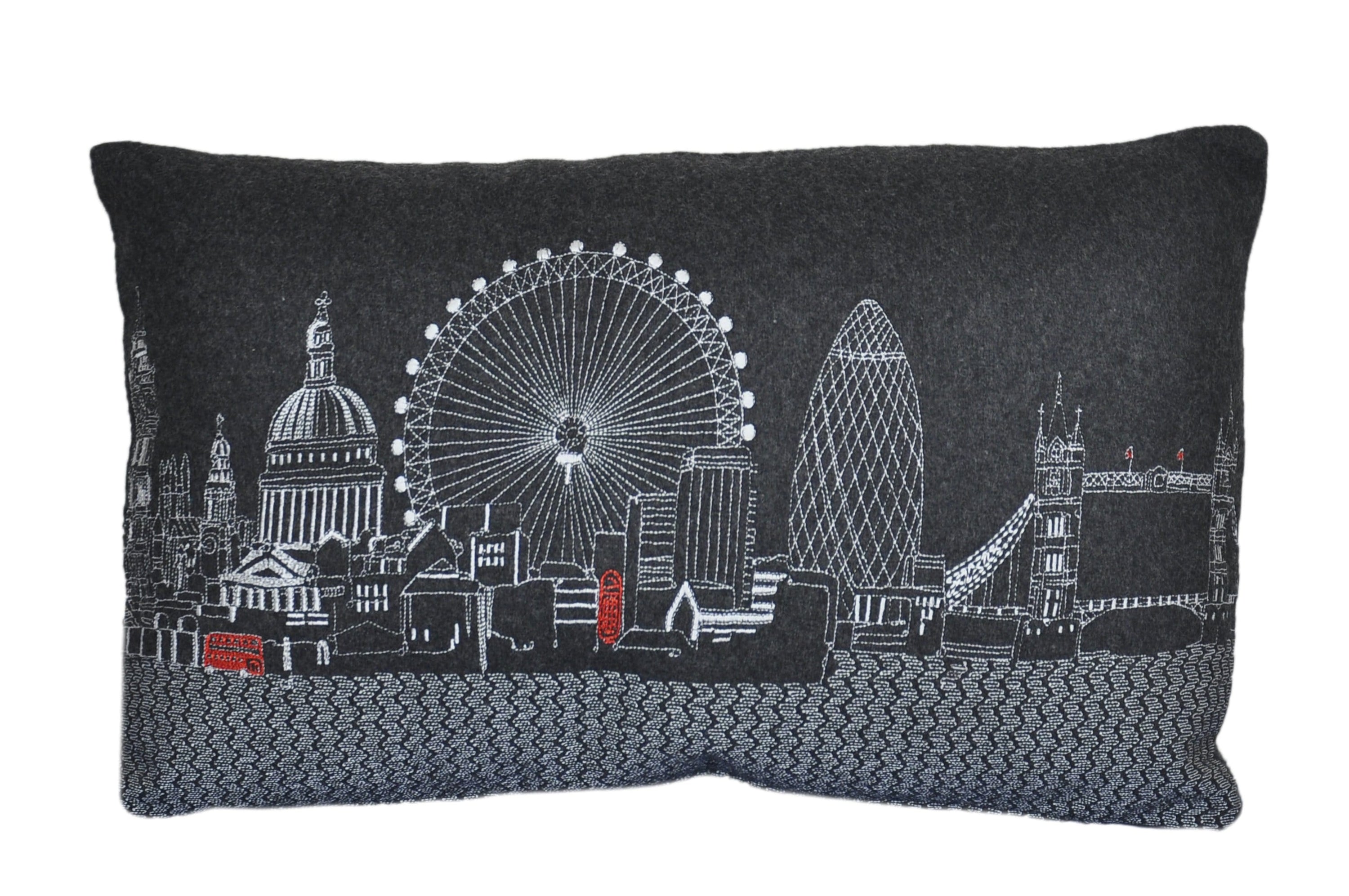 Luxurious London Pillow featuring embroidered landmarks like Big Ben and the London Eye, with a red zipper at the bottom.