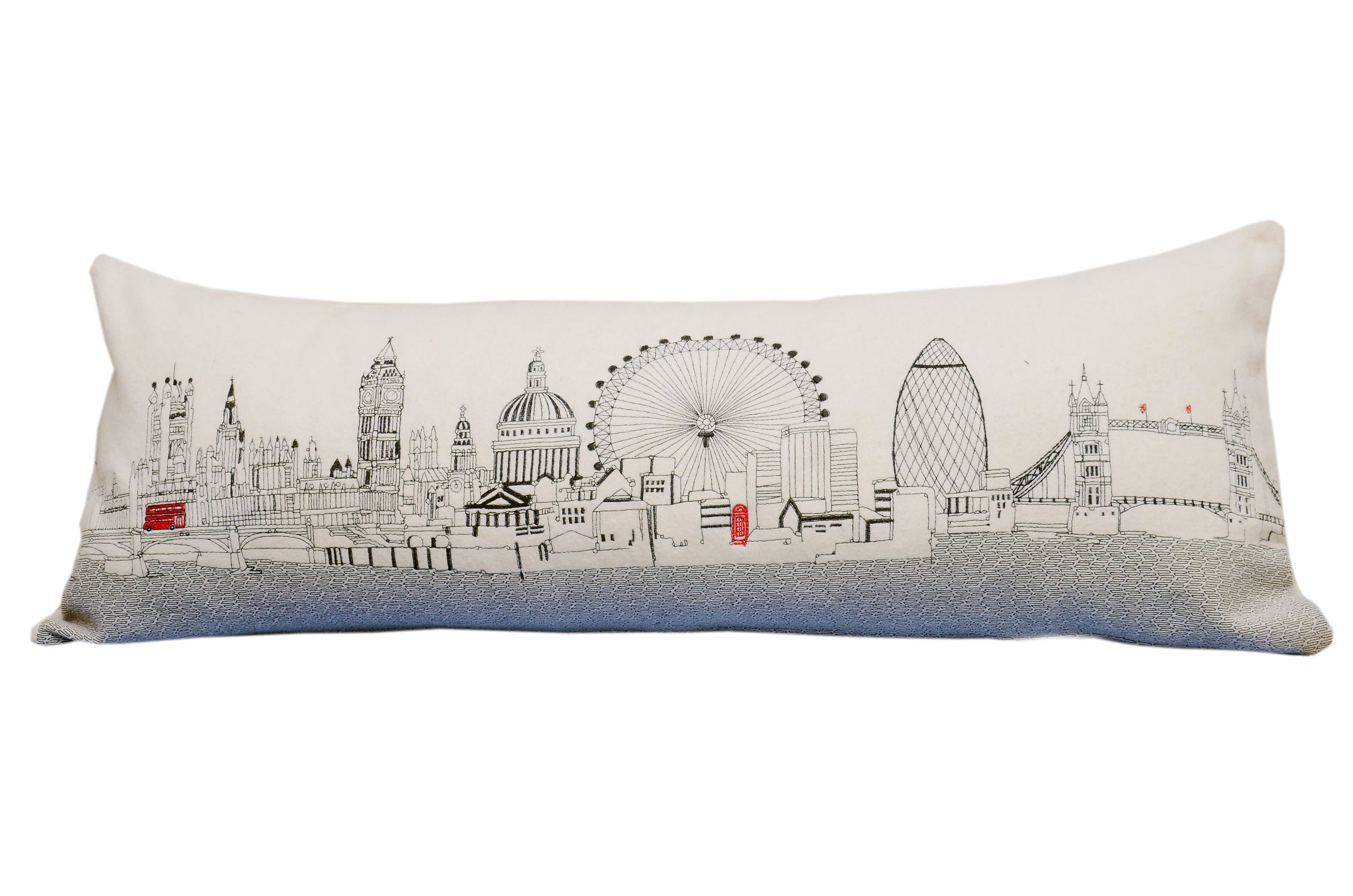 Luxurious London Pillow featuring embroidered landmarks like Big Ben and the London Eye, with a red zipper at the bottom.