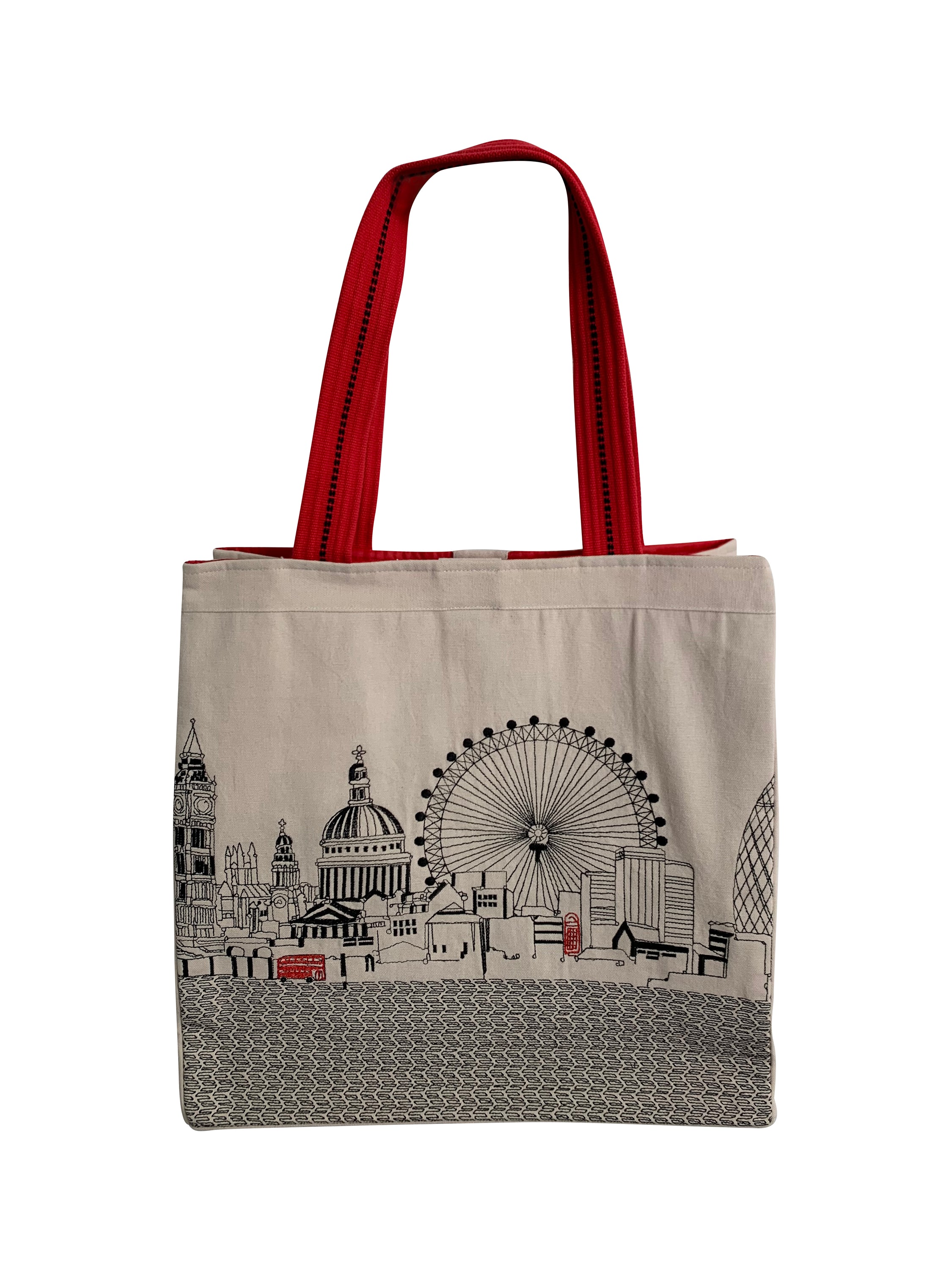 Stylish London Tote Bag with embroidered skyline design in cream and black colors, featuring red waterproof lining and ribbed straps.