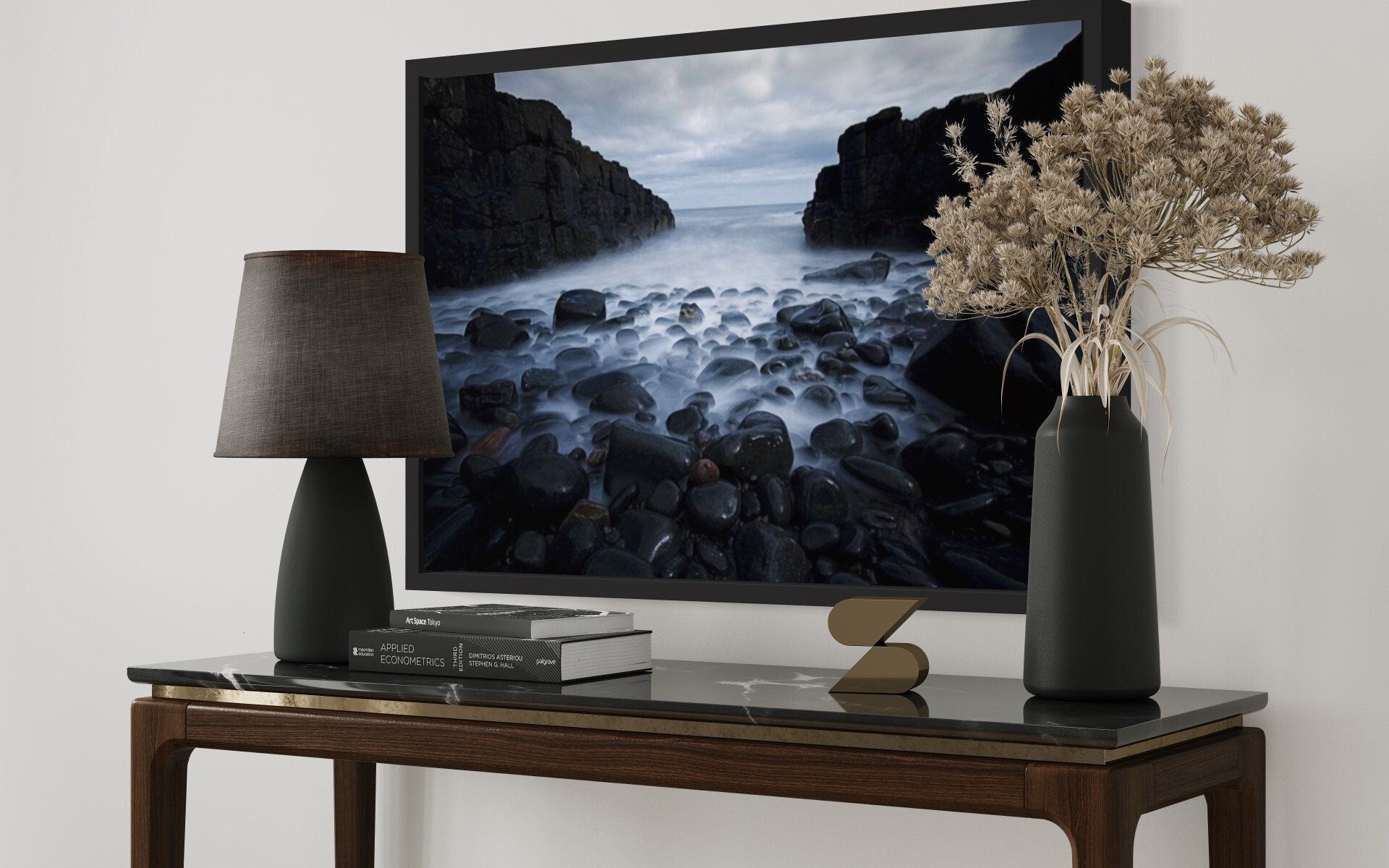 A captivating print of dark cliffs meeting a misty sea, showcasing the rugged beauty of nature in a serene atmosphere.