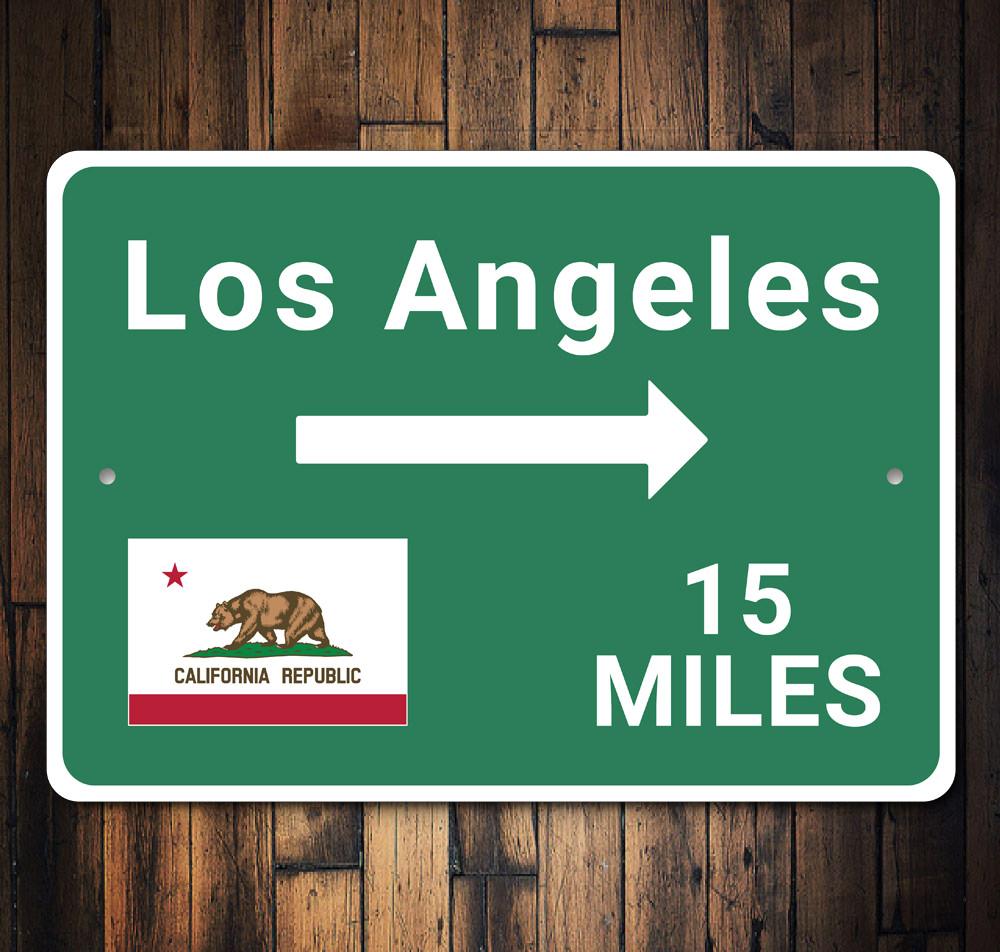 Los Angeles Mileage Sign made of durable aluminum, featuring customizable text and pre-drilled holes for easy mounting.