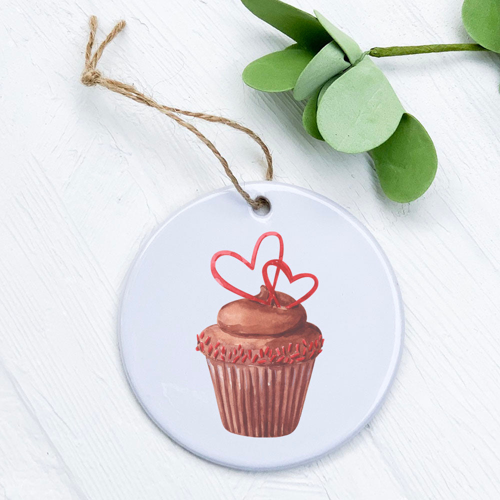 A beautifully designed porcelain ornament featuring a Love and Cupcakes theme, showcasing vibrant colors and a glossy finish.