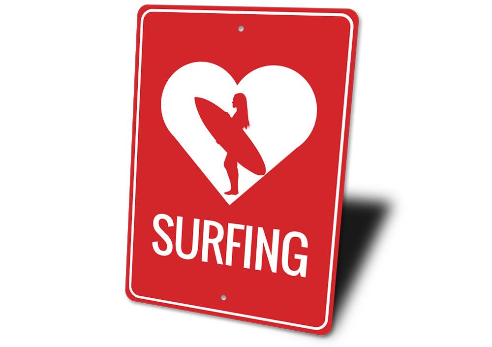 A decorative Love Surfing Sign made of aluminum, featuring vibrant colors and a beach-themed design, perfect for coastal decor.