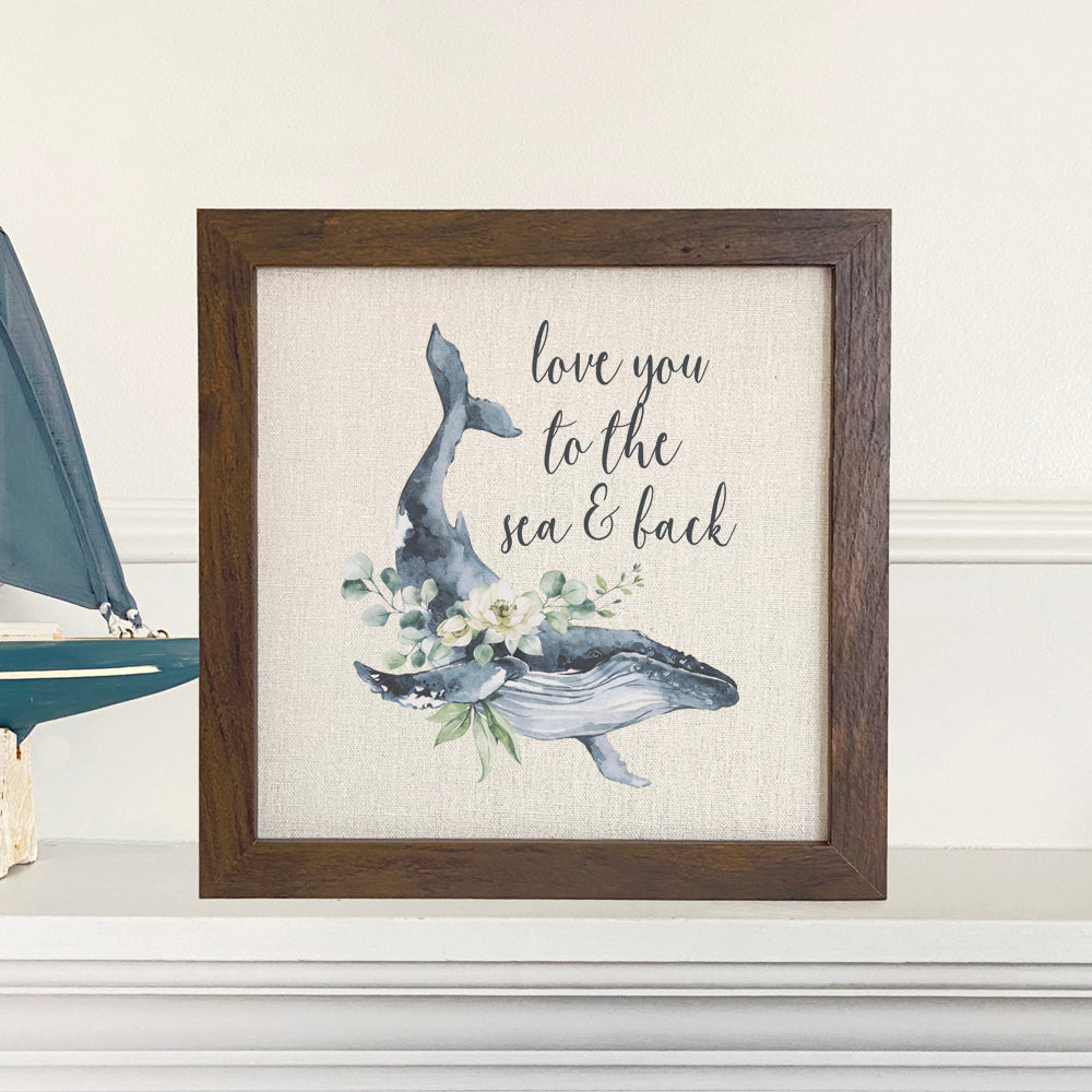 Love Whale framed sign with a stylish wood frame, featuring eco-friendly ink printing on a linen-look background.