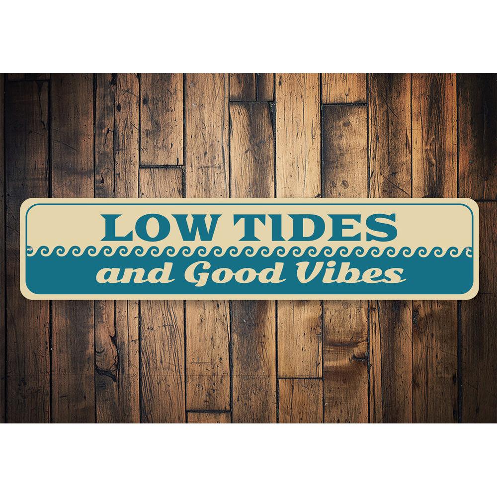 Low Tides and Good Vibes decorative metal sign, featuring a coastal theme with vibrant colors, perfect for home decor.