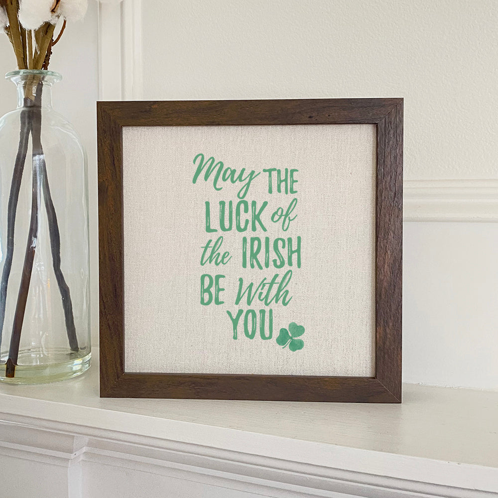 Luck of the Irish framed sign with a stylized wood frame, featuring eco-friendly ink printing on a linen-look background.