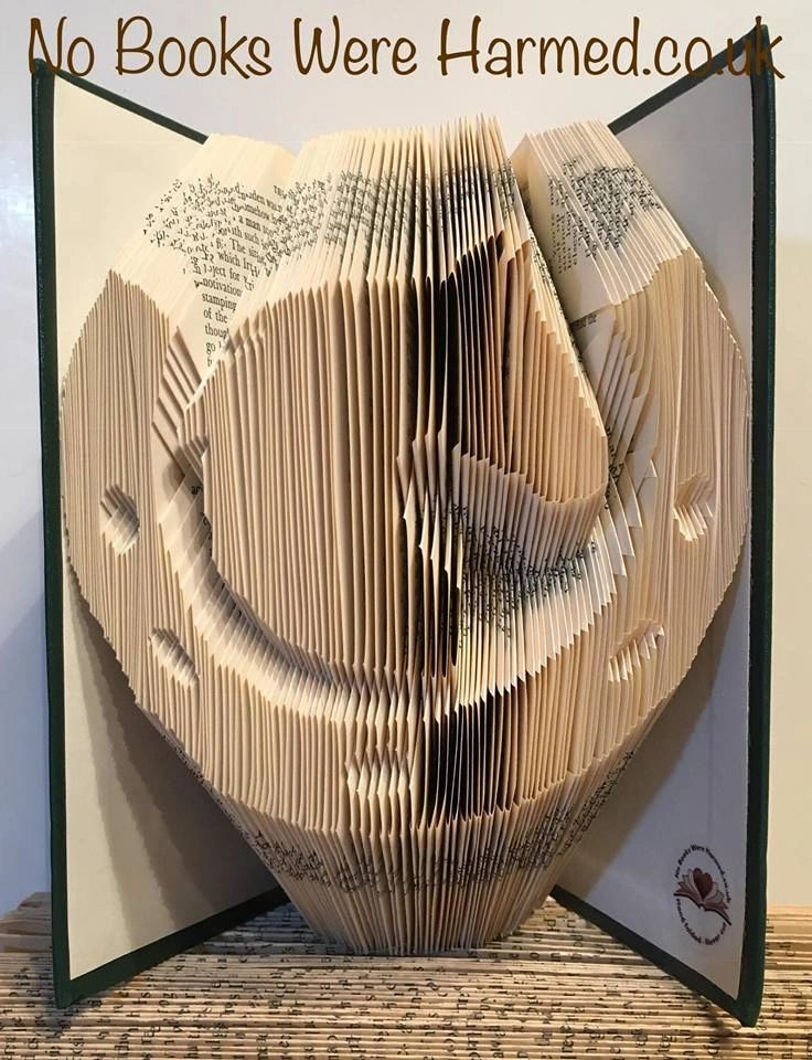 Handcrafted Lucky Horse's Head in Horseshoe made from vintage book pages, showcasing intricate folds and unique design.