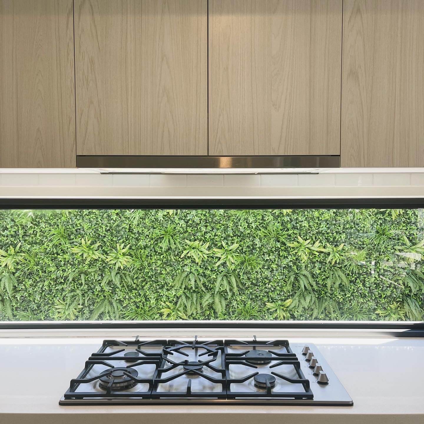 Luxury Green Sensation Artificial Vertical Garden Wall Panel showcasing a blend of grasses, ferns, and succulent-like stems, perfect for indoor and outdoor use.