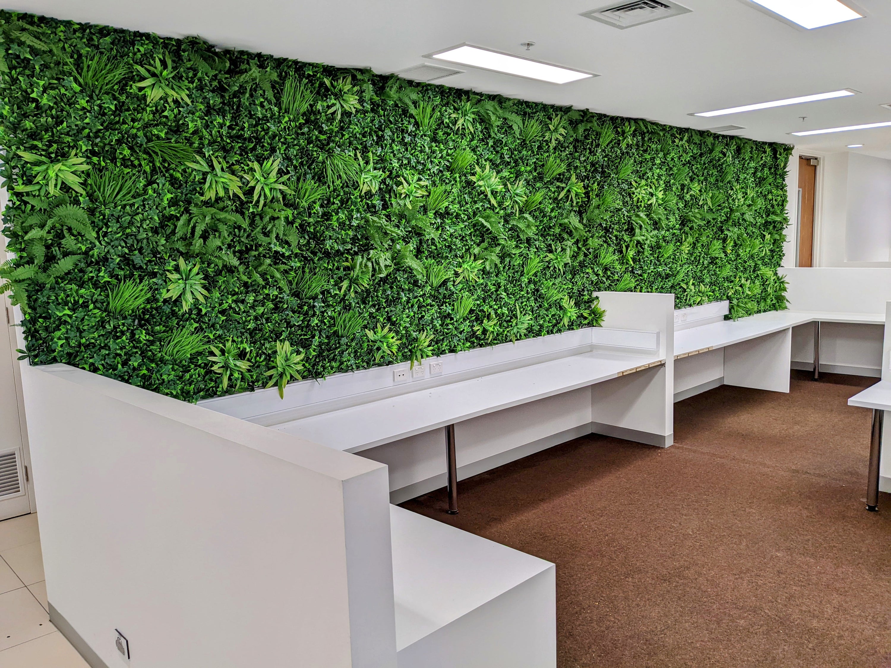 Luxury Green Sensation Artificial Vertical Garden Wall Panel showcasing a blend of grasses, ferns, and succulent-like stems, perfect for indoor and outdoor use.