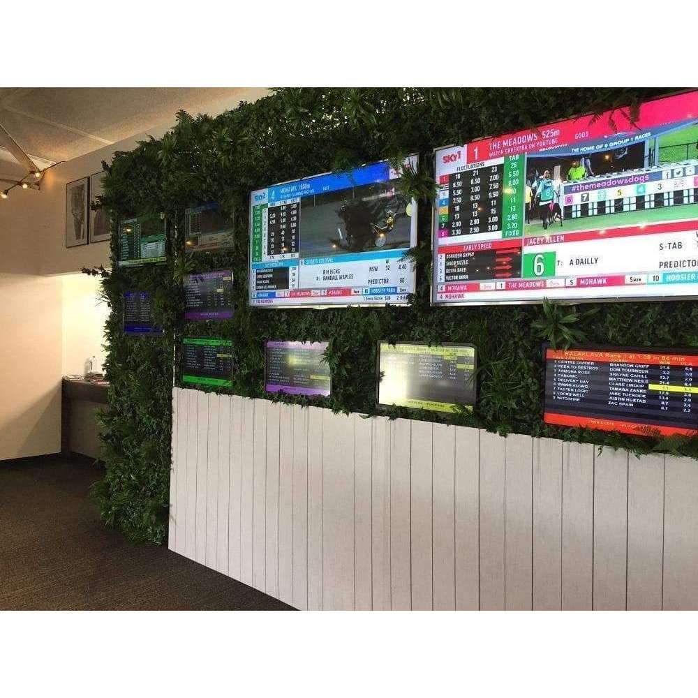 Luxury Green Sensation Artificial Vertical Garden Wall Panel showcasing a blend of grasses, ferns, and succulent-like stems, perfect for indoor and outdoor use.