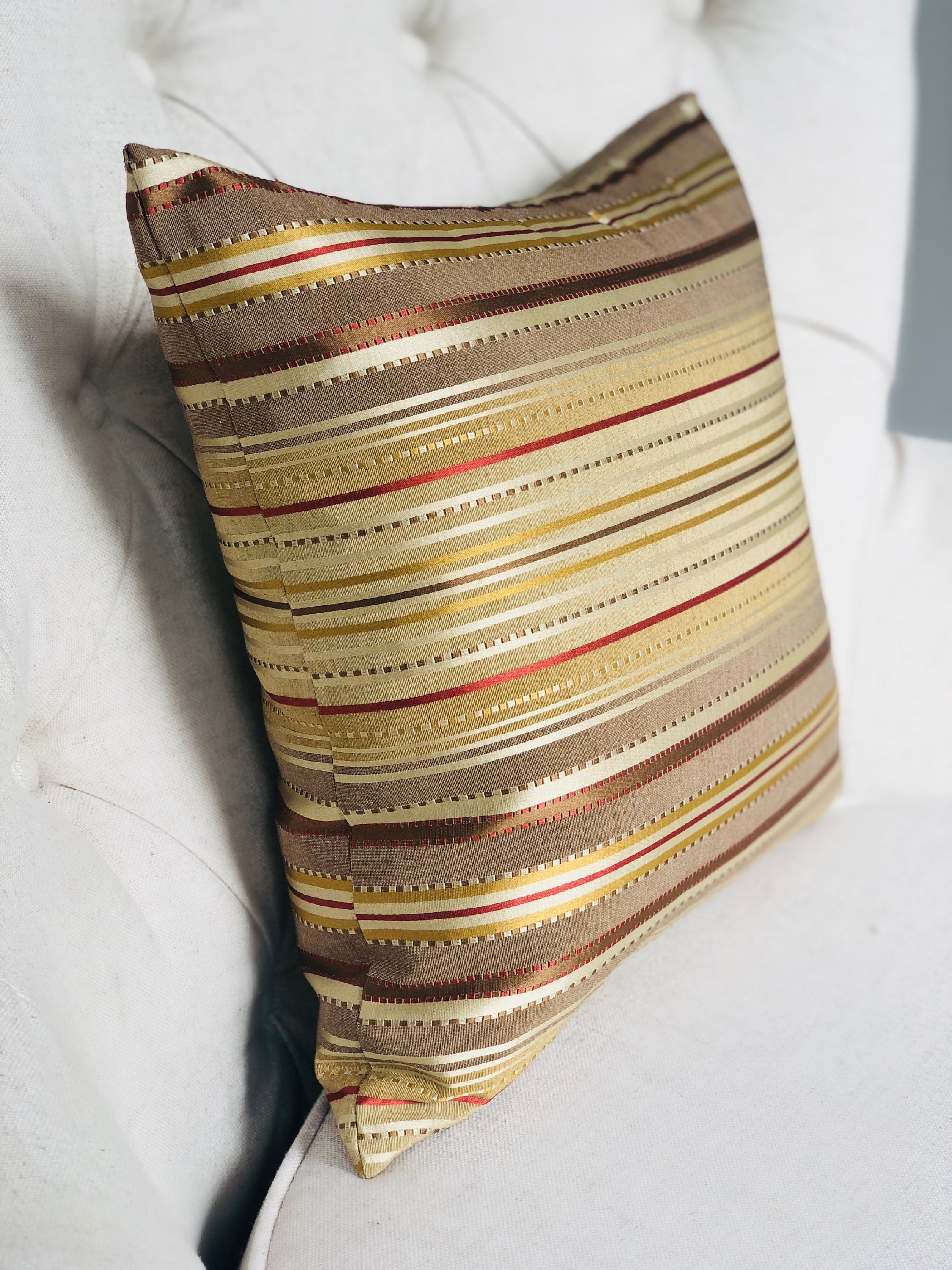 Macedonia Gold Red and Silver Handmade Luxury Pillow featuring a striped pattern with an invisible zipper, showcasing its elegant design and quality craftsmanship.