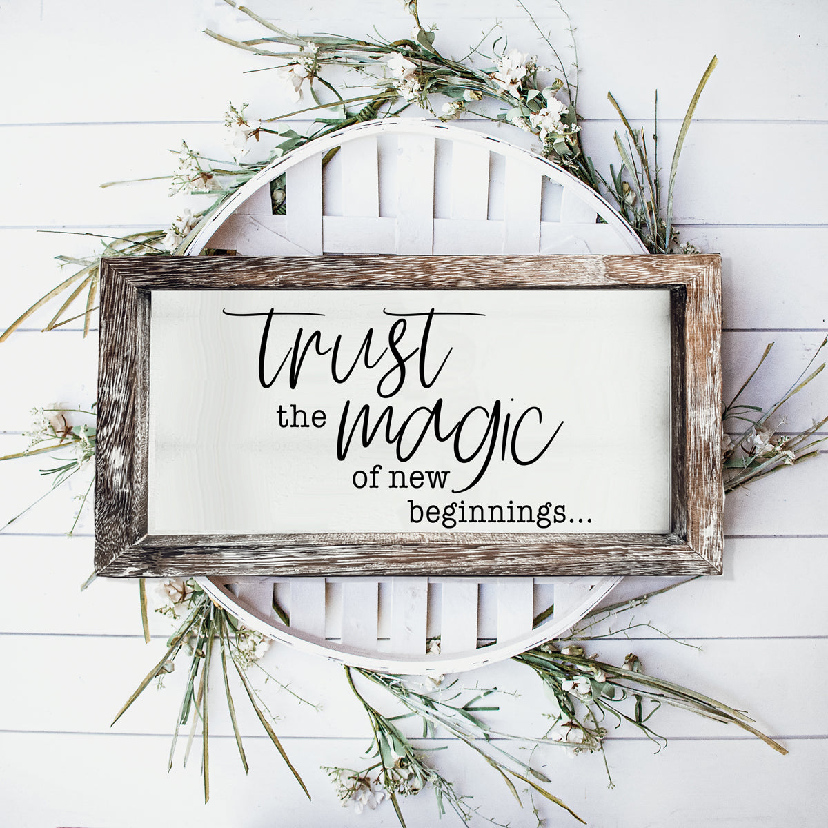 A stylish wooden sign featuring the quote 'Trust in the Magic of New Beginnings', crafted from durable Paulownia wood.